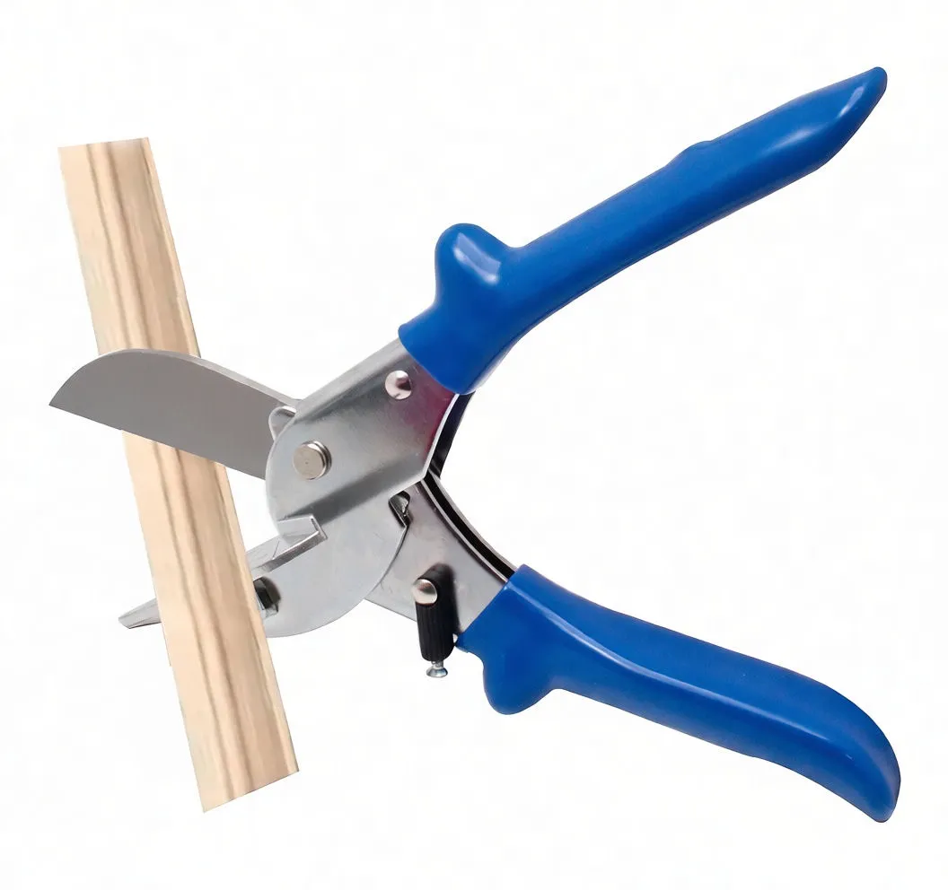 single pair of blue-handled shears cutting a profile strip