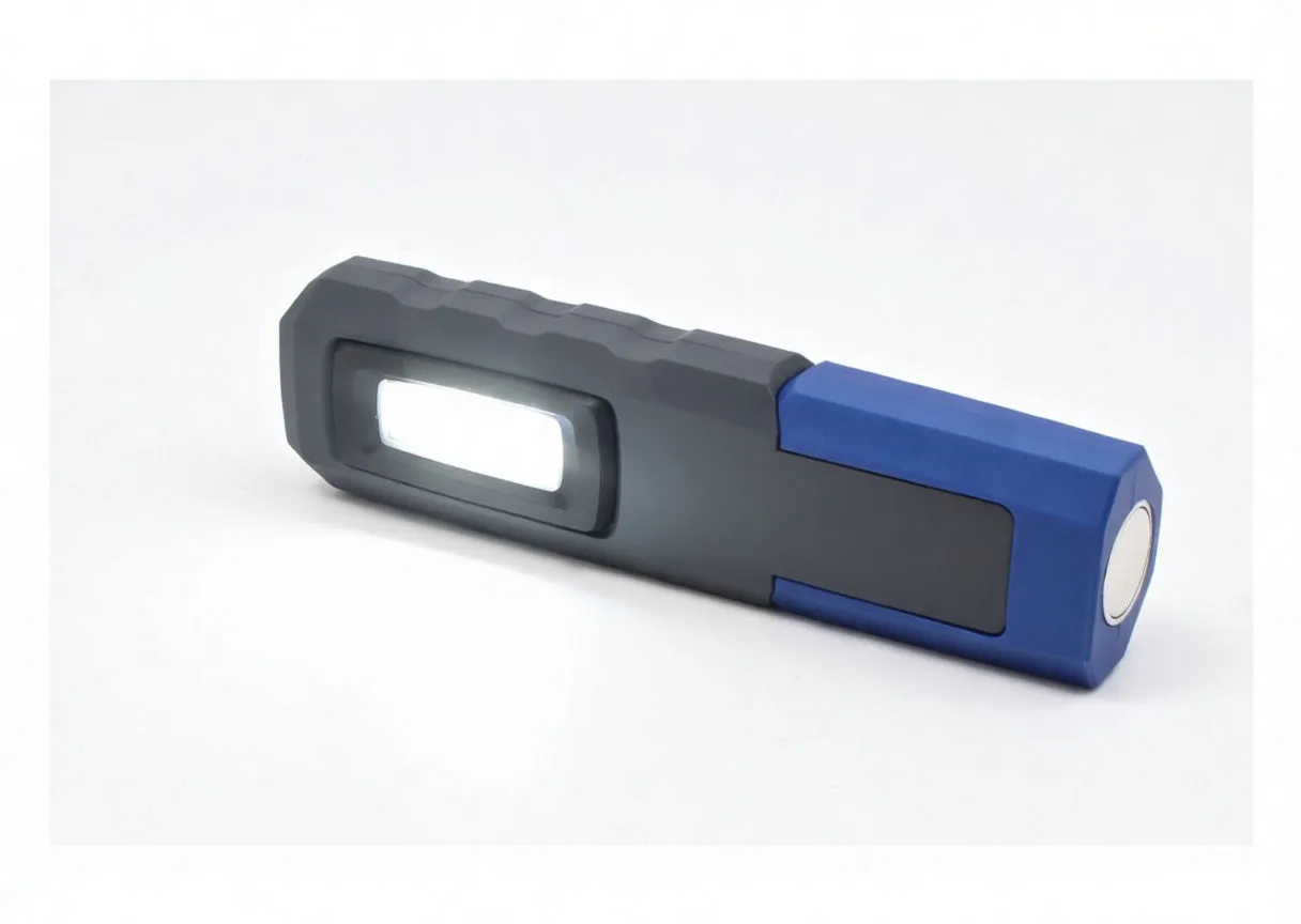 Angled view of work light showing COB strip, ASTA logo and magnet label