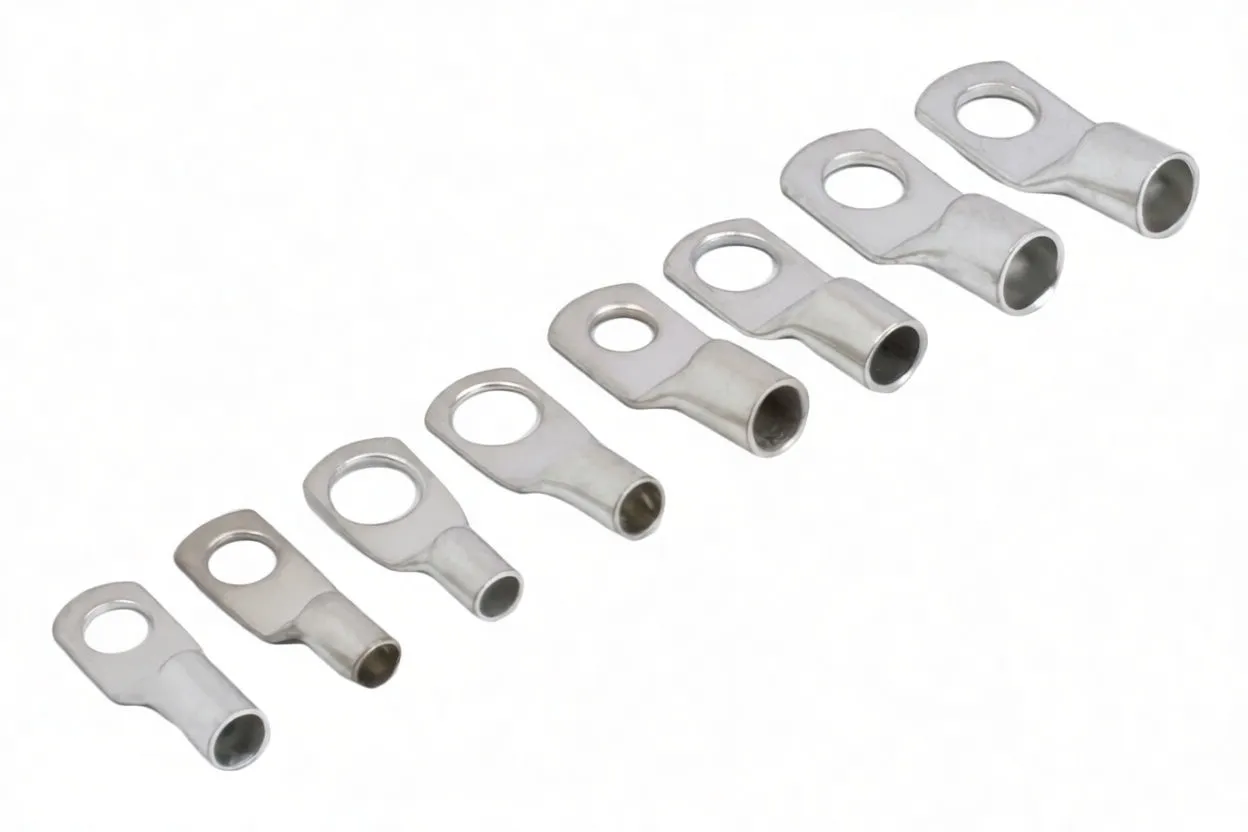 Row of individual tin-plated copper tube lug terminals showing barrels, rings and stamped size markings