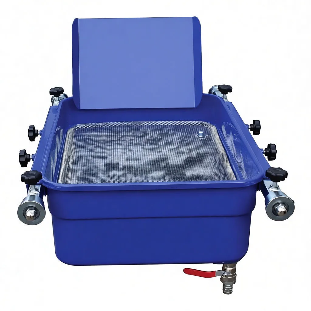 Front view of blue ASTA drain pan showing mesh, splash guard, star knobs and red-handled drain valve