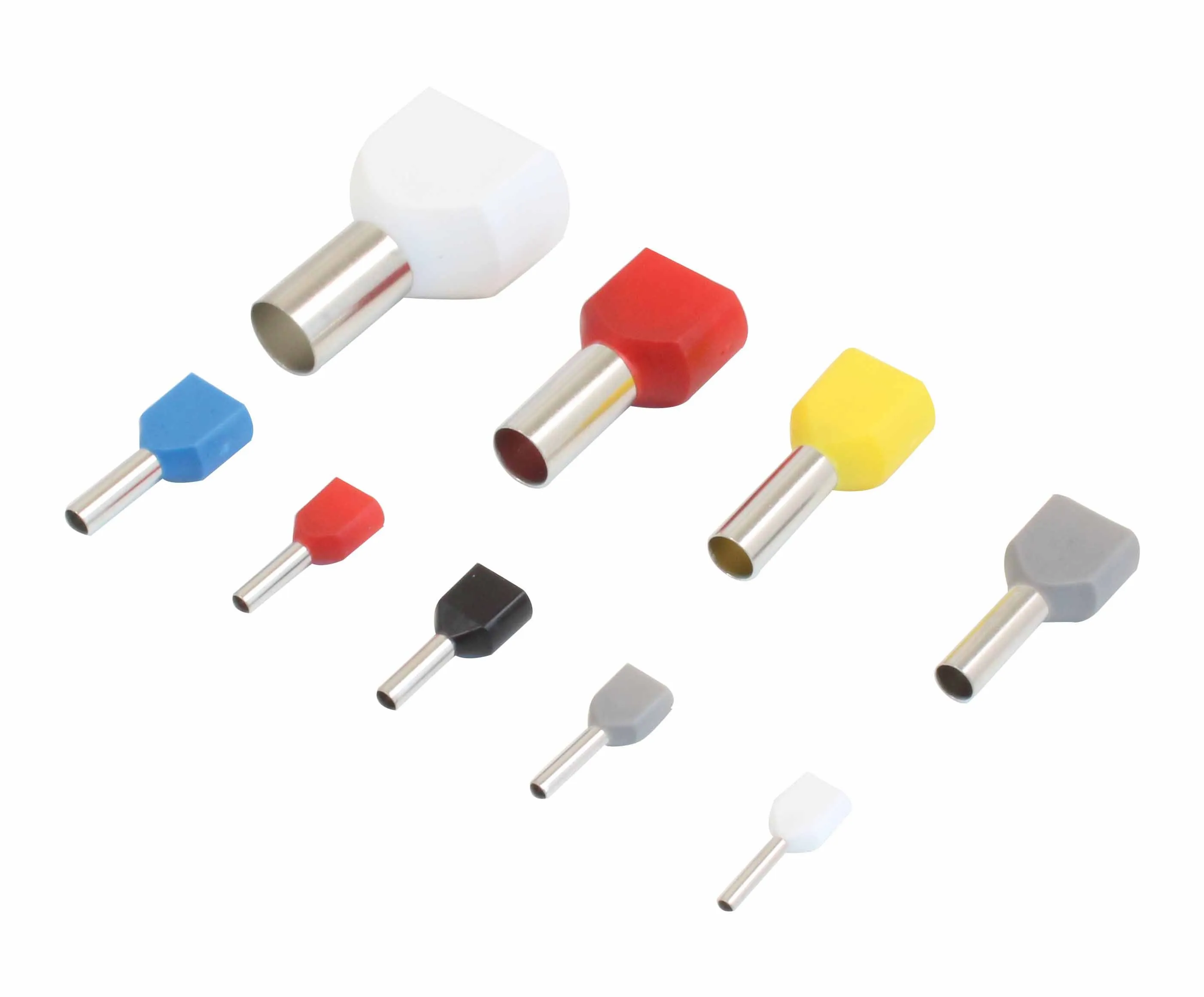 Several sizes of insulated twin cord end terminals with metal ferrules and colored plastic collars arranged on white background.