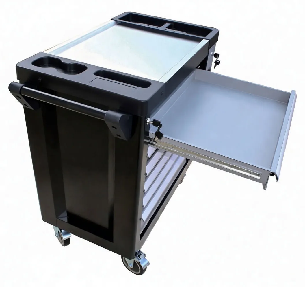 Open drawer showing socket set, ratchets and extensions in foam insert of rolling tool cabinet.