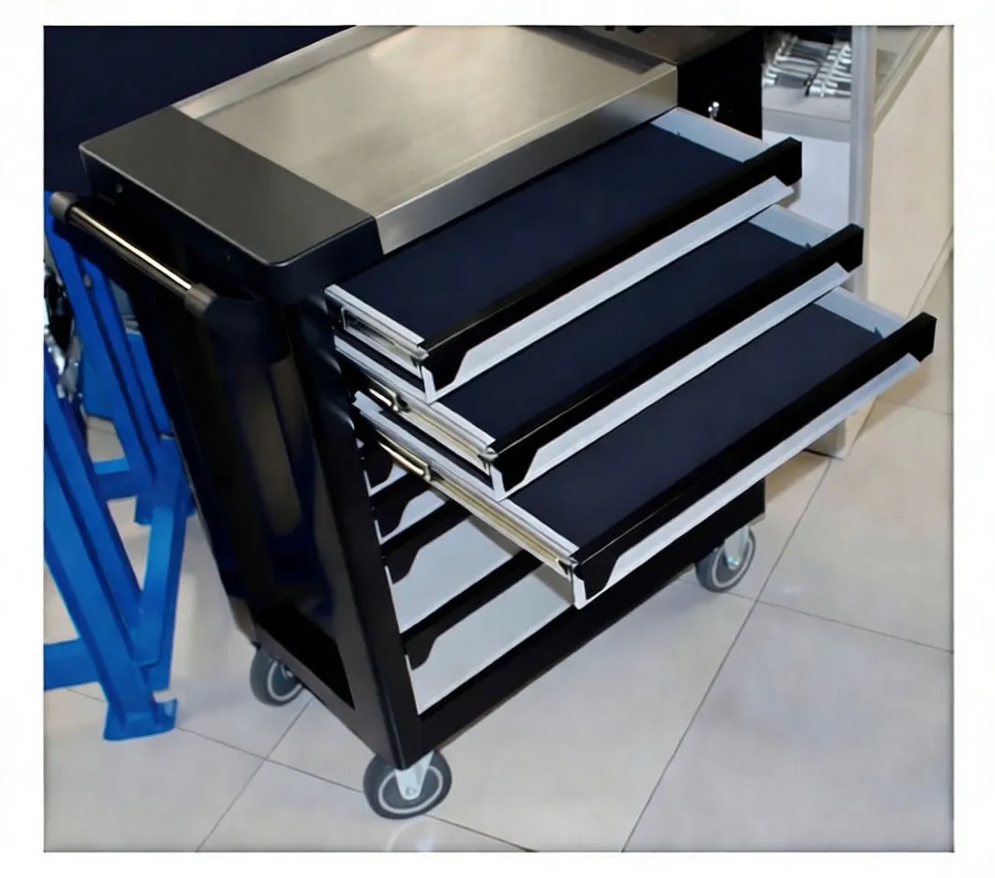 Tool cabinet with many drawers open and separate panels showing organized foam tool set