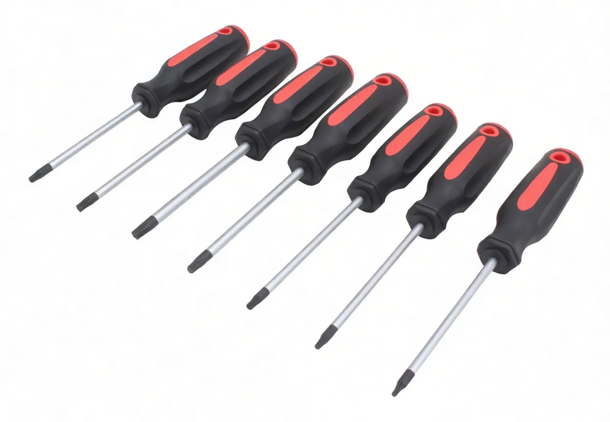 Seven black and red Torx screwdrivers with silver shafts and dark Torx tips arranged in a row