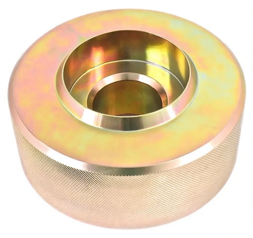 Top oblique view of round zinc-plated clutch gauge adapter showing recessed cavity, seating rings and ASTA A-VACL text