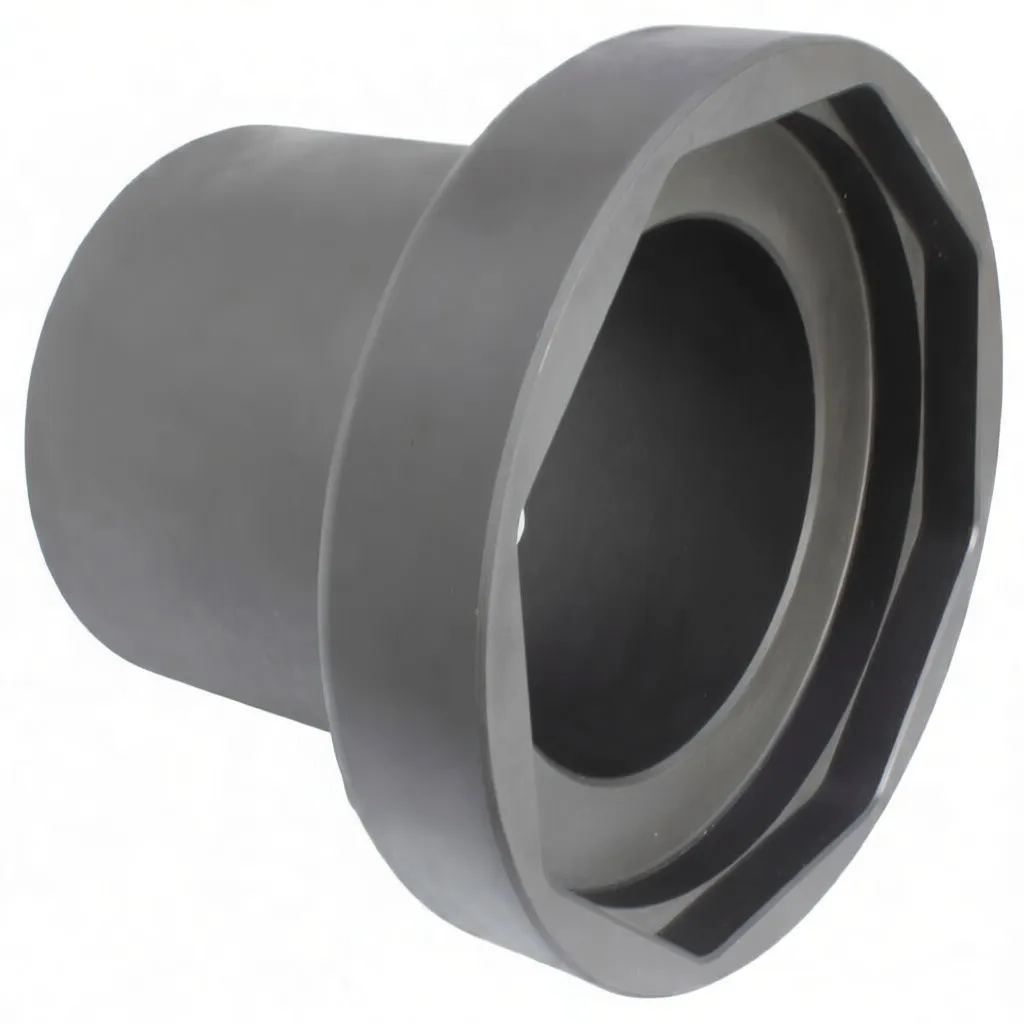 Three-quarter top view of an 8-sided hub socket showing octagonal interior, central bore, side pin hole and dark matte metal finish.