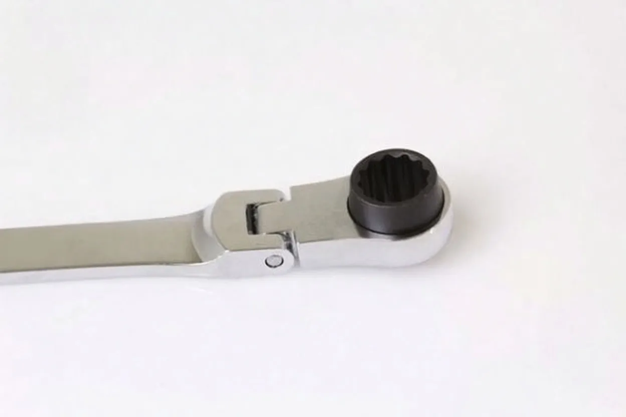 Close-up of ratchet head showing hinged joint and black 12-point insert