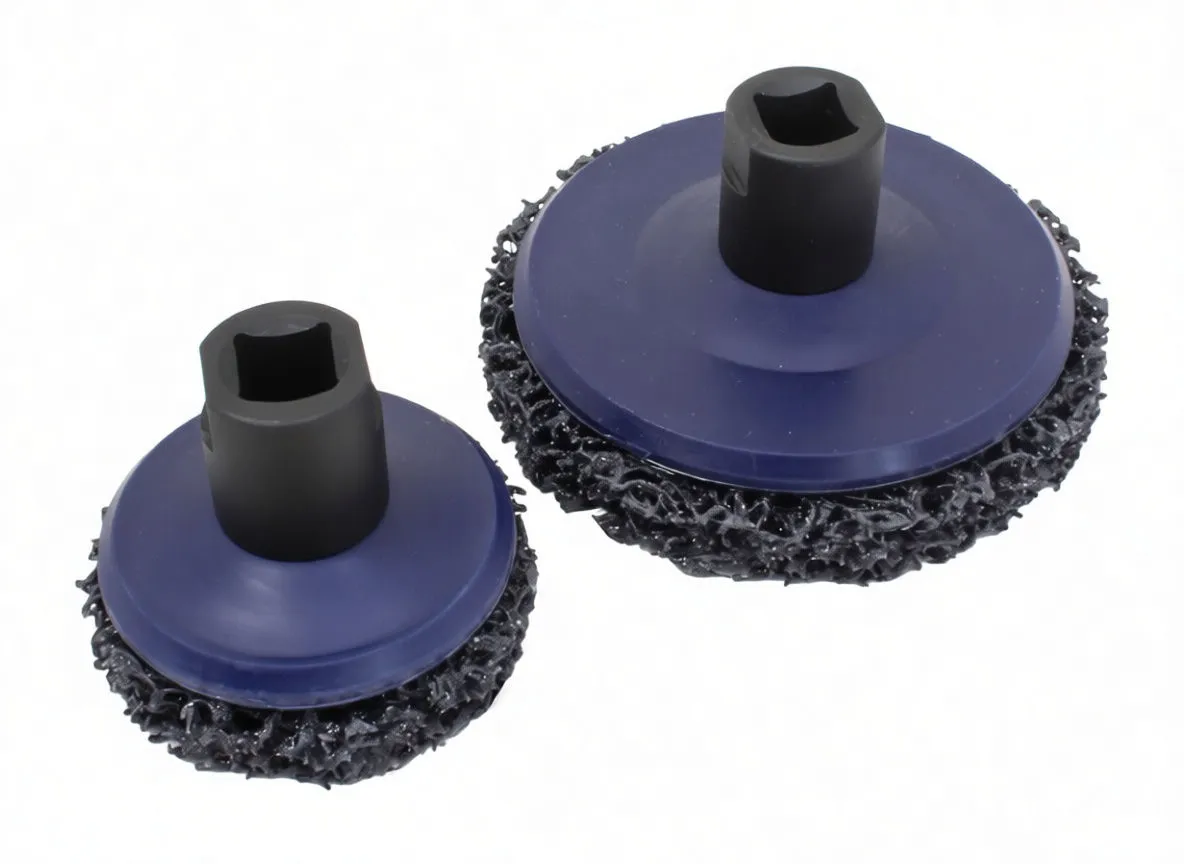 Large open-mesh abrasive disc face beside smaller disc with ASTA marked square-drive hub