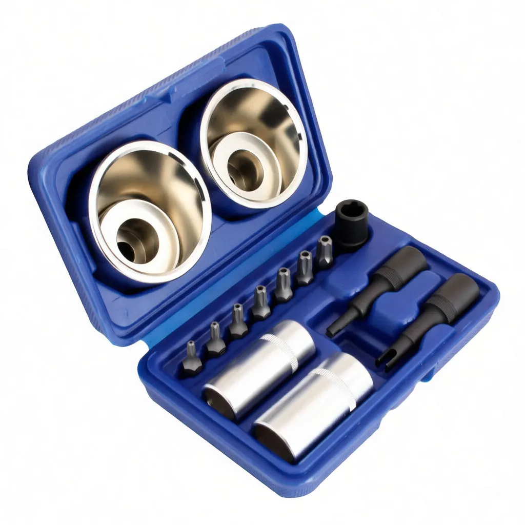 Individual sockets, adapters and a row of small driver bits displayed on a white background