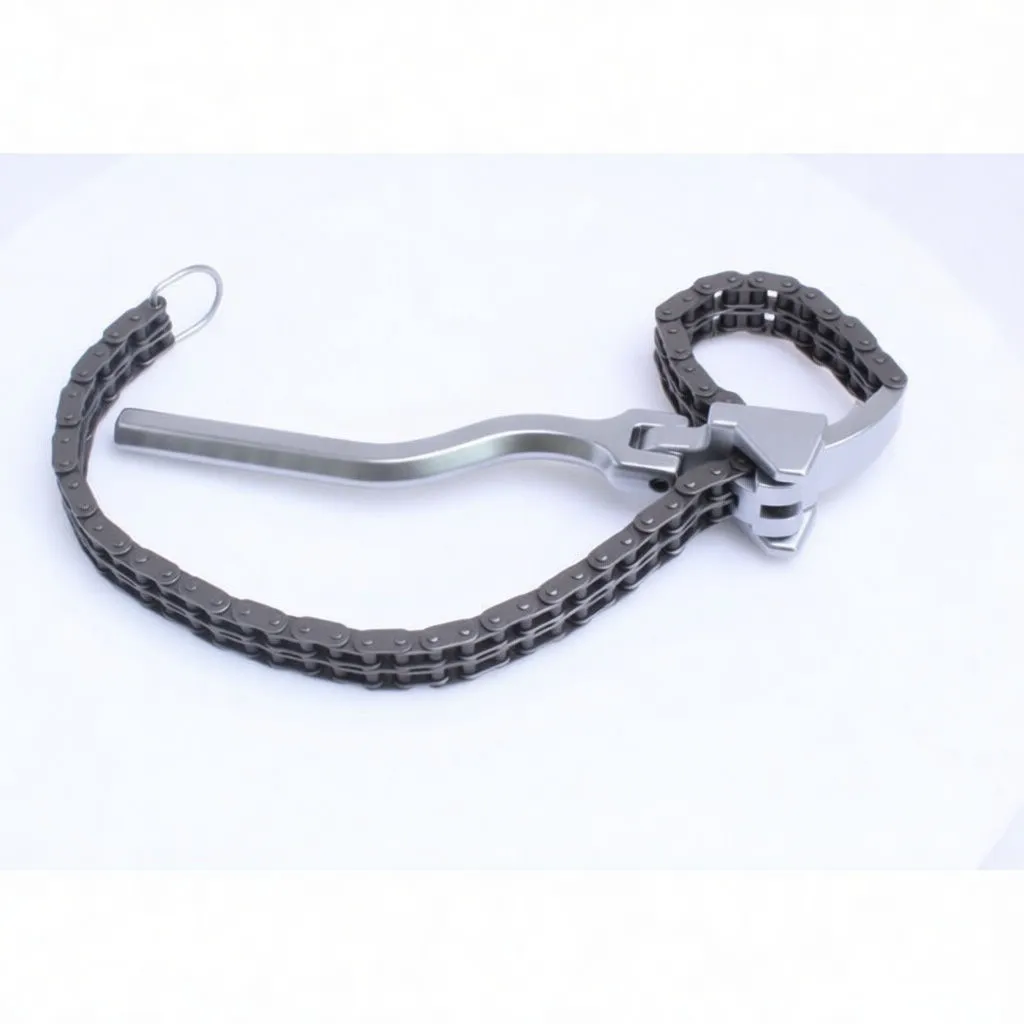 Flat-lay image of chain-style adjustable oil filter wrench with long handle and extended chain