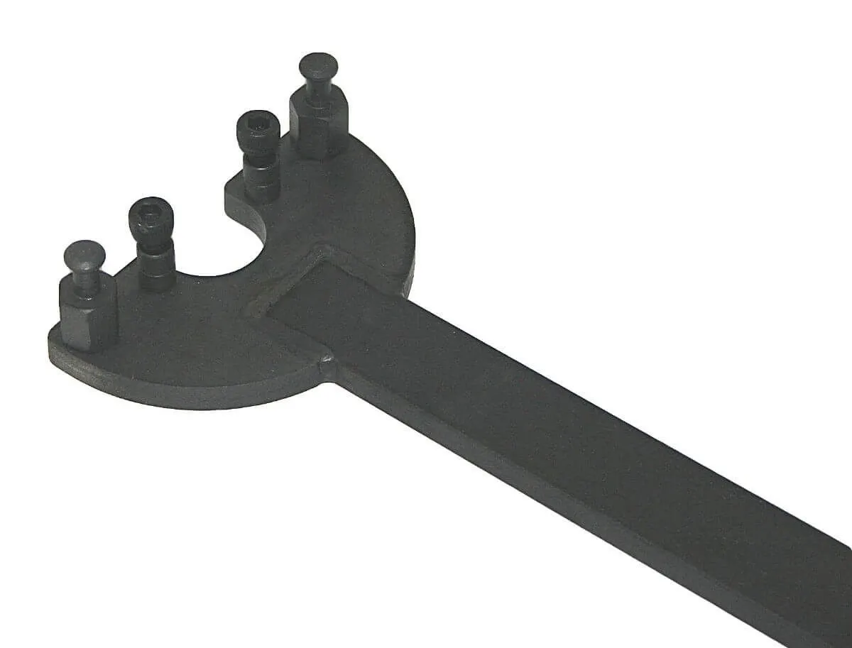 Close-up of adjustable crescent head with pins and nuts