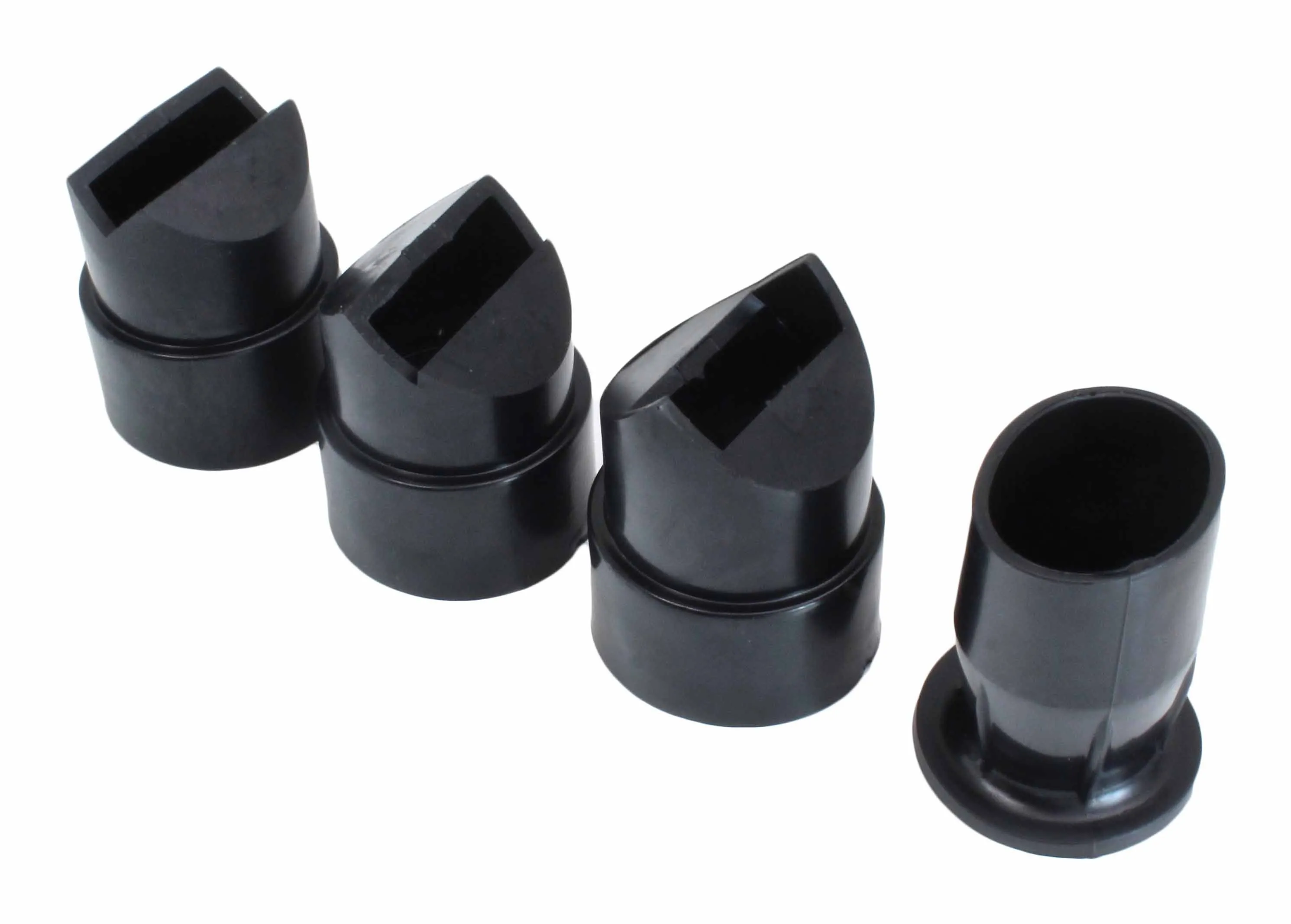 Set of four black plastic nozzle adapters including three angled outlets and one round sleeve