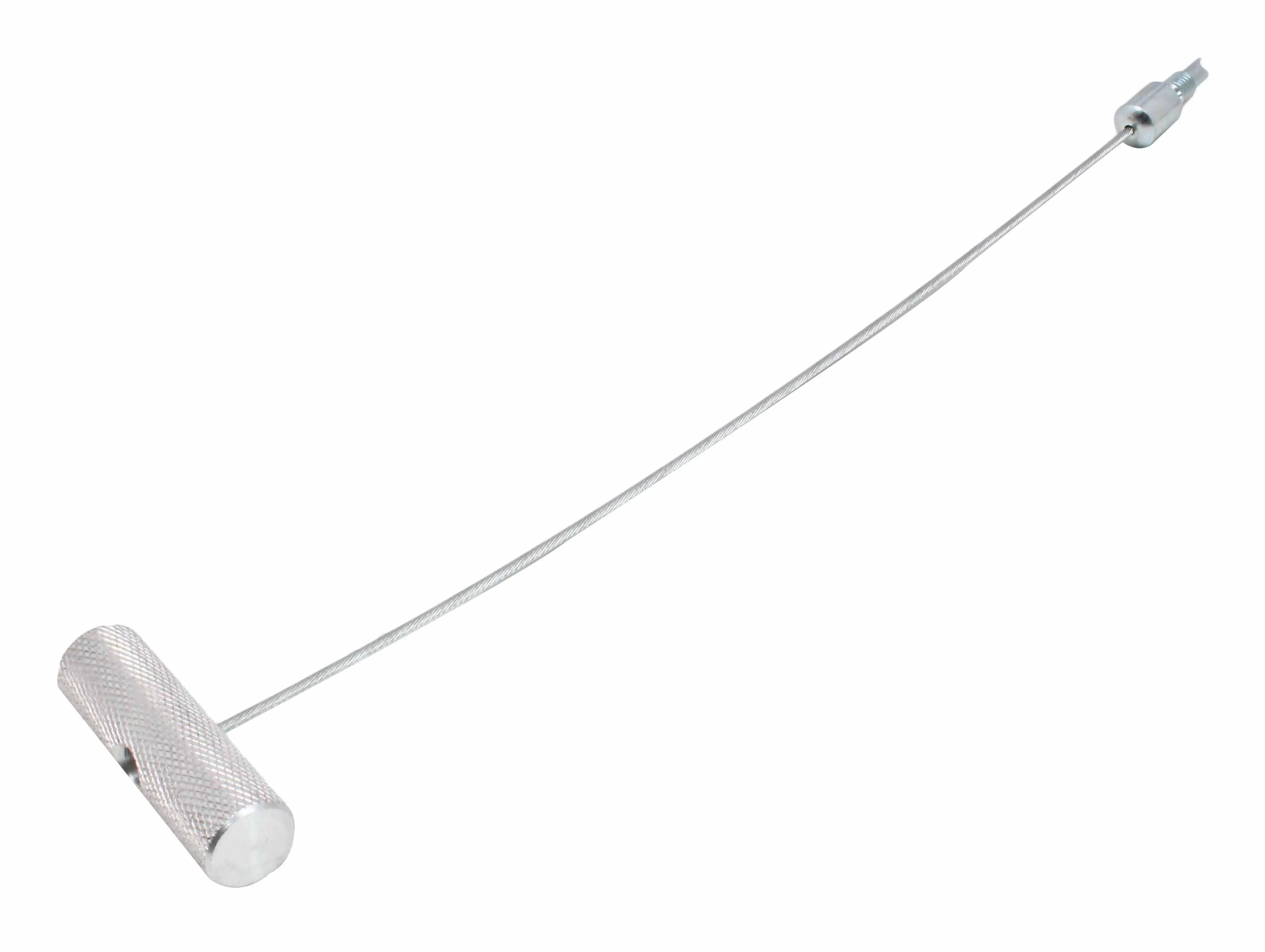 Angled shot of valve core puller with textured metal handle and flexible braided cable ending in a threaded fitting