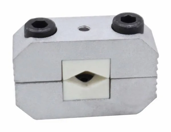 Front view of aluminium clamp jaw showing split halves, white central insert with diamond aperture, two black socket bolts and central threaded hole