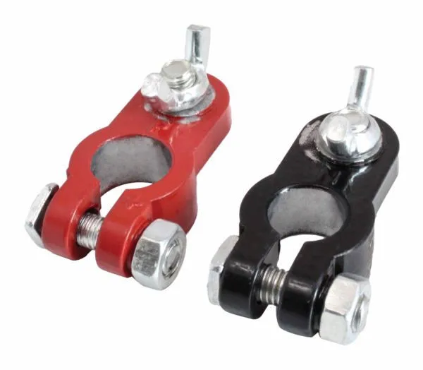 Angled view of red and black battery terminal connectors showing post cavities and clamping bolts