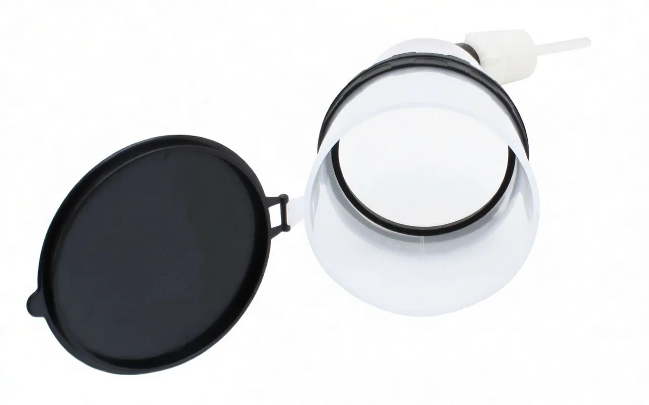 Side view of funnel with open black cap, internal star-shaped baffle and central rod visible; black elbow, white connector and clear outlet tube attached.