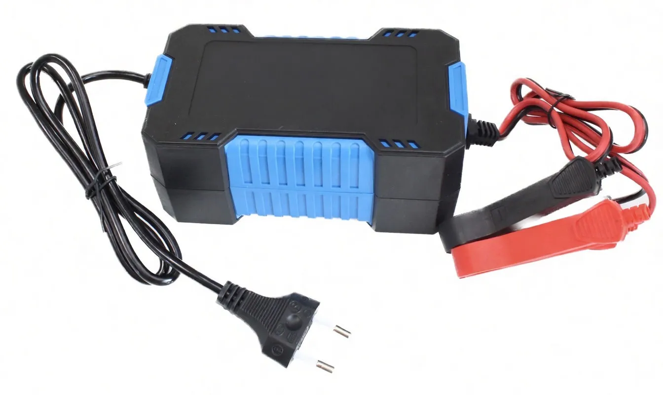 Top/front view of 12V 6A charger with LCD, brand label, European plug and red/black clamps.