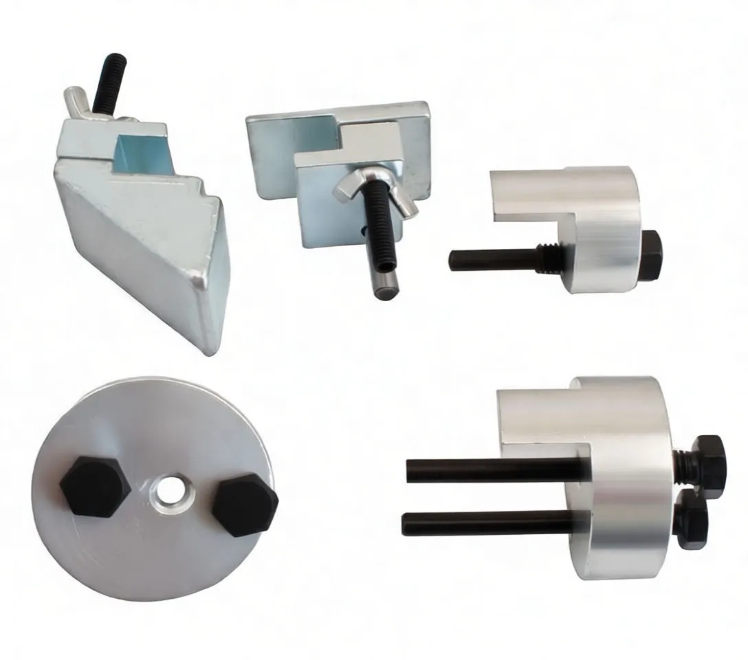 Individual parts of an auxiliary stretch belt removal kit on white background: wedge clamp, square plate with threaded stud, small and large C‑shaped adaptors, round adapter plate marked 'satra S-BS268', and black bolts.