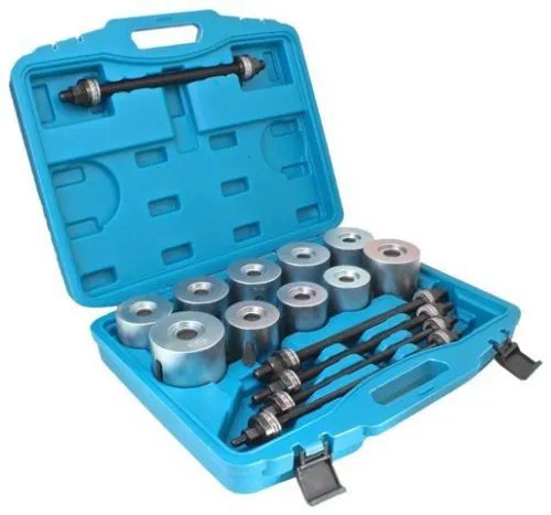 Perspective view of open blue case with different sized silver press cups and black spindles laid out