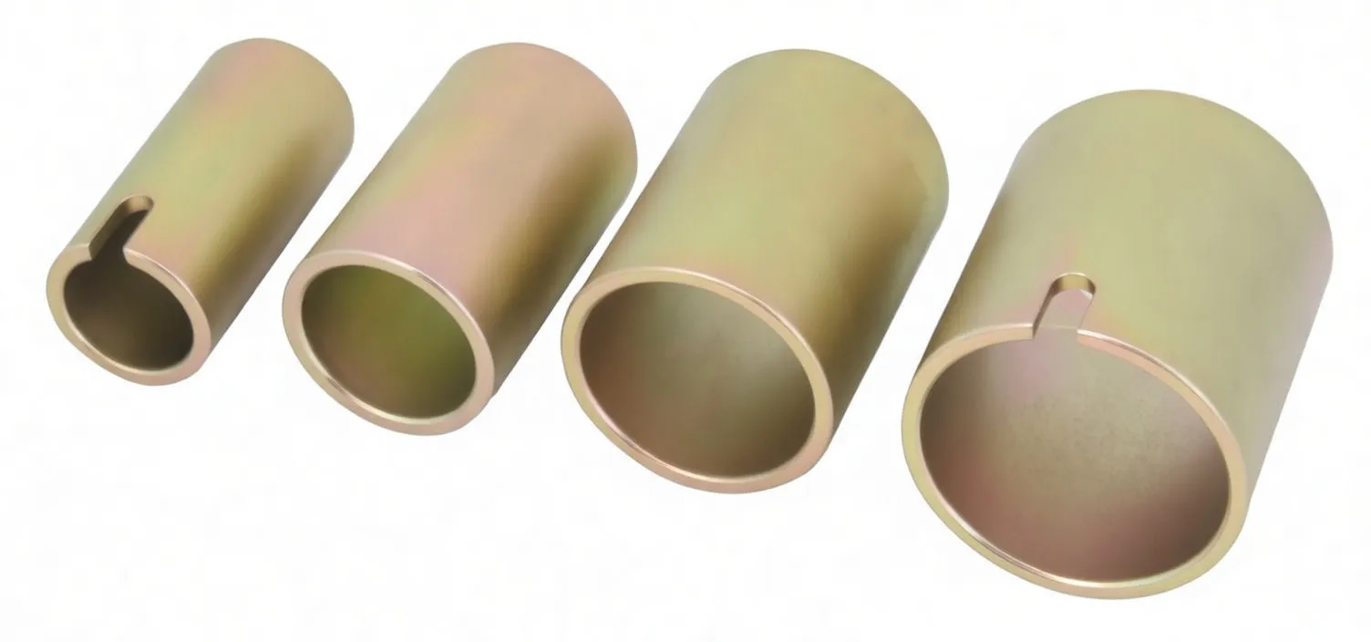 Four hollow gold/zinc plated cylindrical driver sleeves in graduated sizes with rim notches