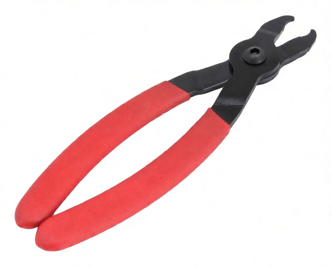 Angled view of master link pliers with red grips and open black forked jaws, 'ASTA' marking visible