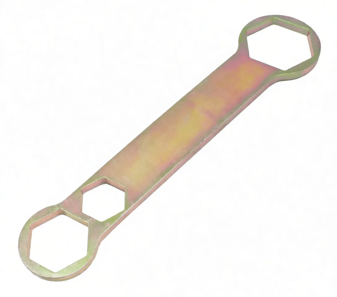 Angled top view of ASTA fork cap wrench with three hex openings (41, 32, 24 mm) and gold plated finish