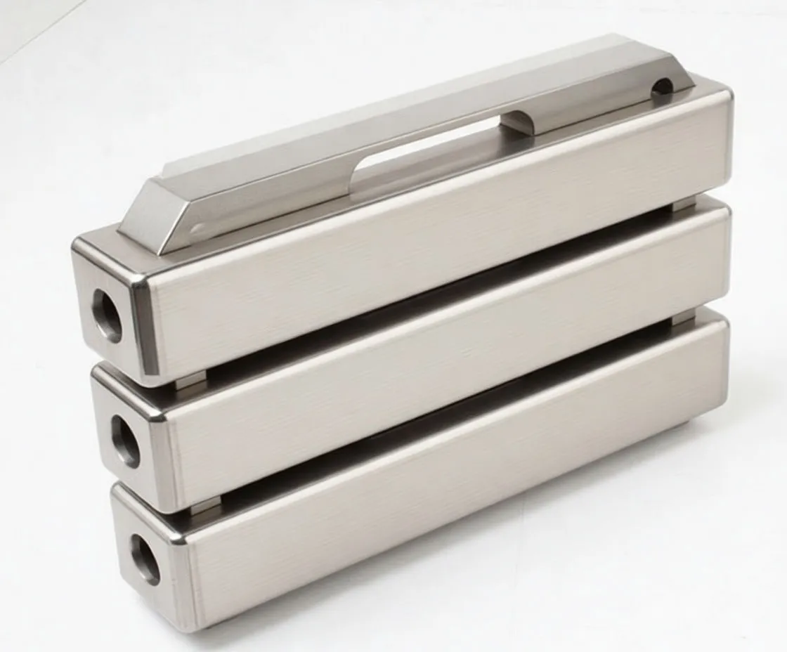 Three silver adapter bars stamped FORD, OPEL, VAG and ASTA logo