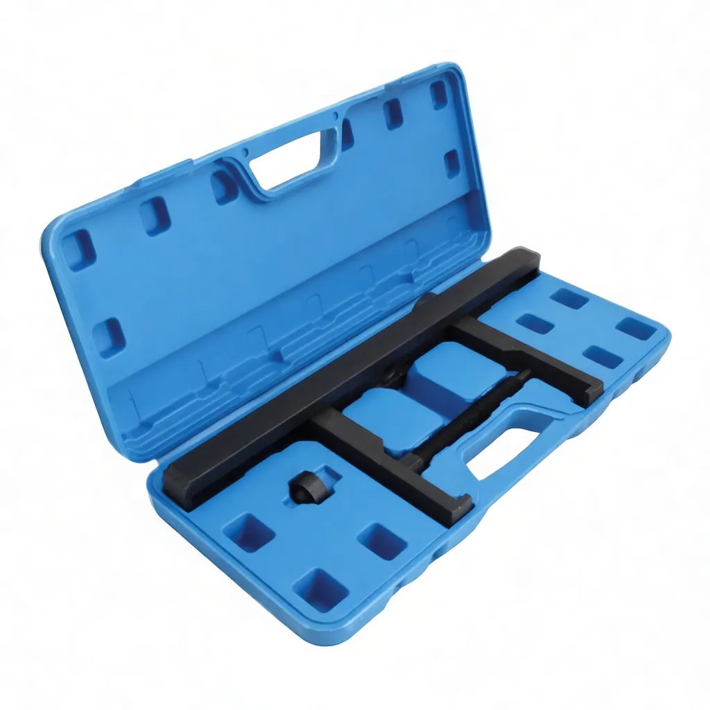 Angled shot of blue case holding a black brake disc puller with arms and threaded screw