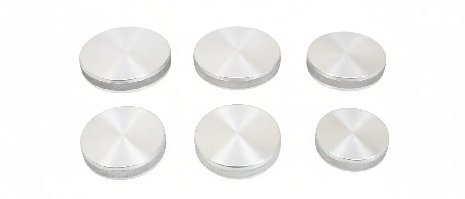 Diagonal arrangement of six aluminum caps, one tilted to show internal rubber seal