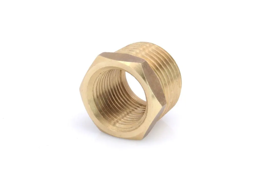 Top/front view into female thread of brass reducer bushing showing hexagonal outer shape