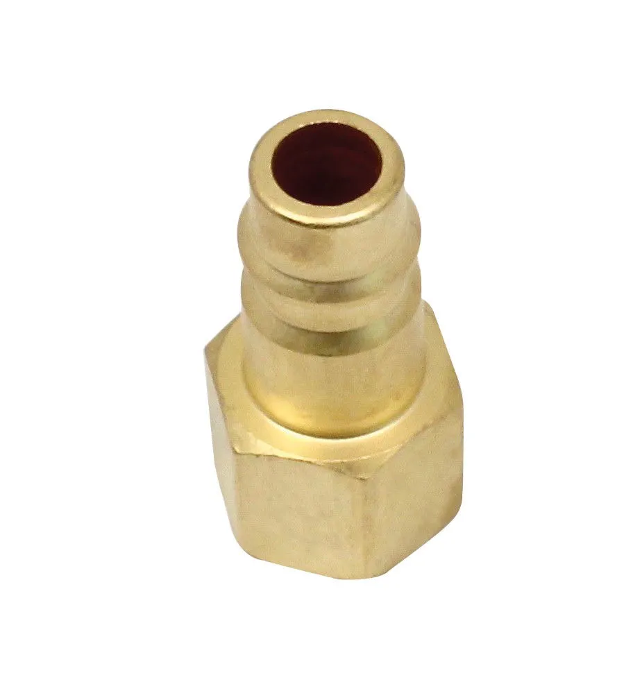 Top view down the hose barb of a brass quick connector showing bore and retention rings.