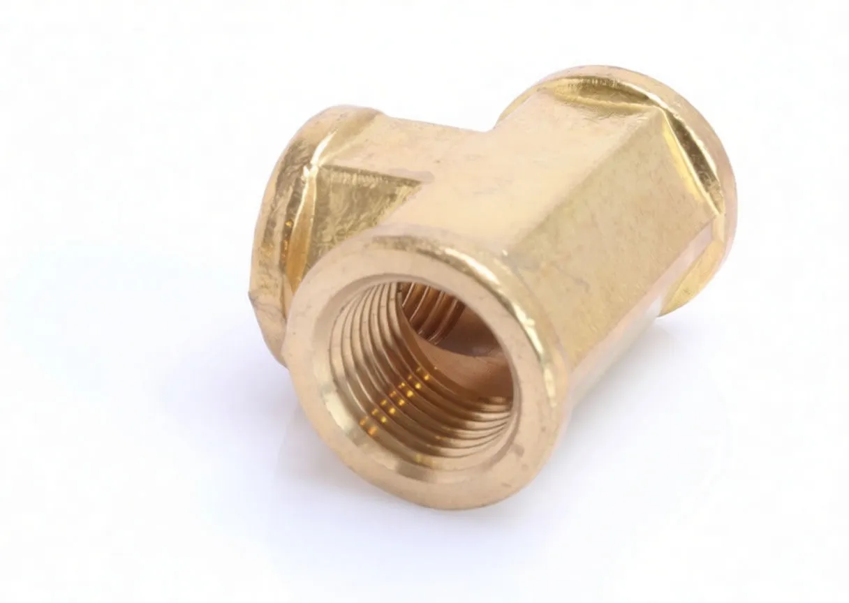 Front-facing view of a brass T-connector with one female threaded port prominent and two other branches visible.