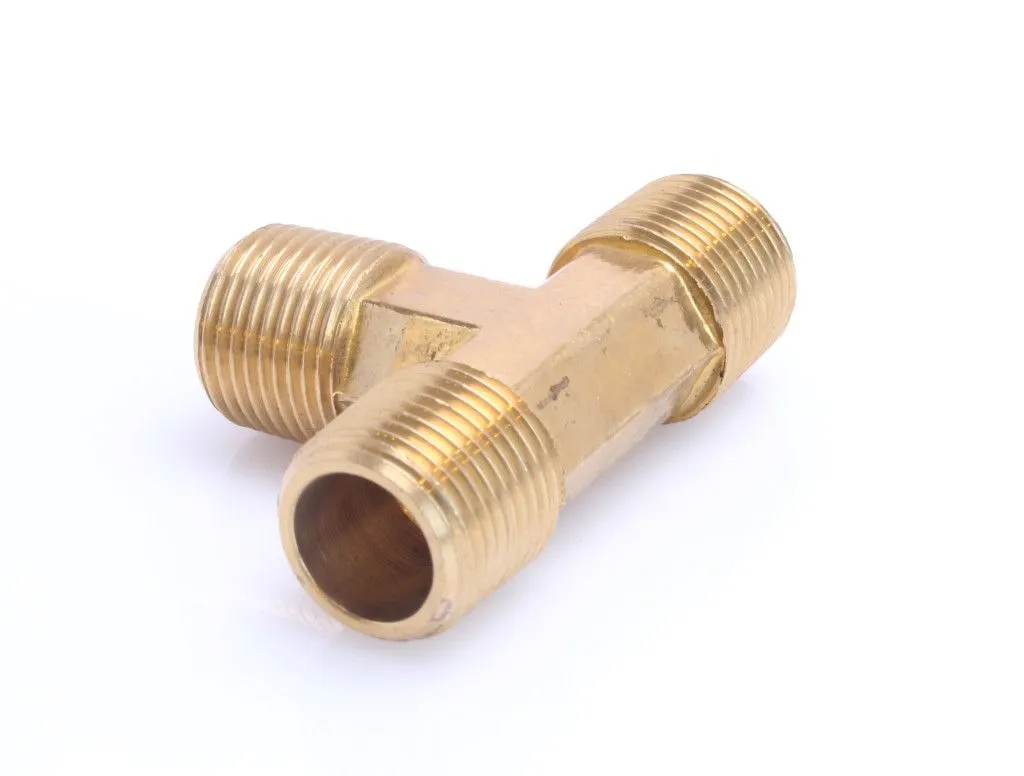 Close-up of brass T-connector showing threaded ends and inner bore