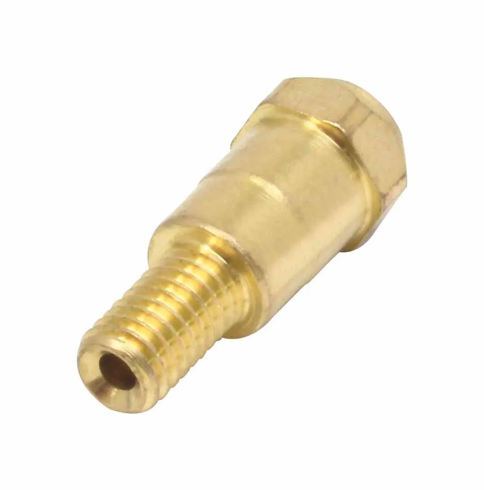 Brass connector showing M6 external threads and small central bore, hex collar visible in background