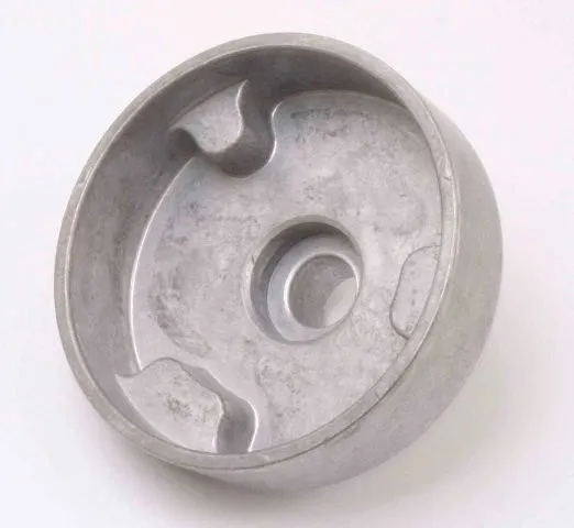 Angled inside view of camshaft wrench showing shaped internal pockets and central stepped hole