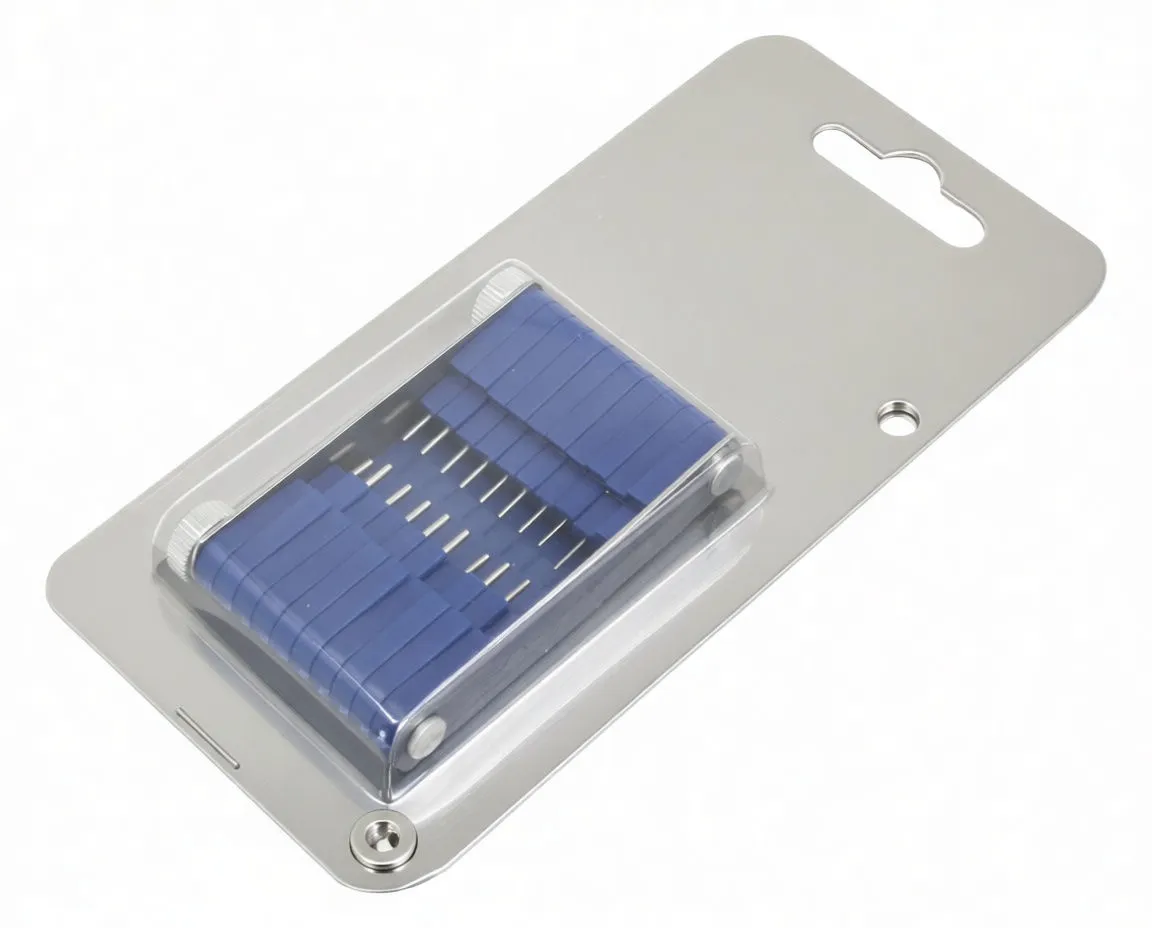 Angled shot of cleaning tool showing ASTA logo on metal side, blue blocks and rows of metal probe pins