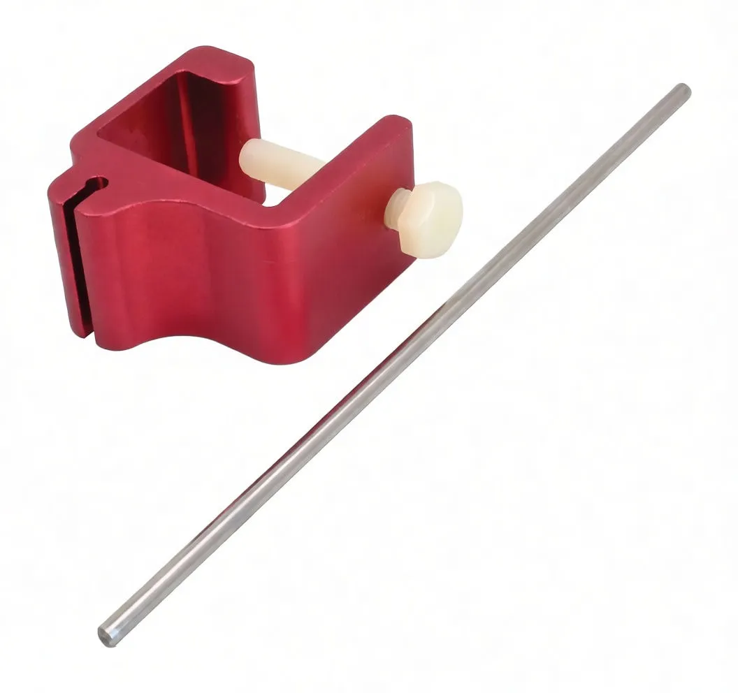Side view of red chain alignment tool showing ASTA logo, plastic spacer and spring clip with long metal rod