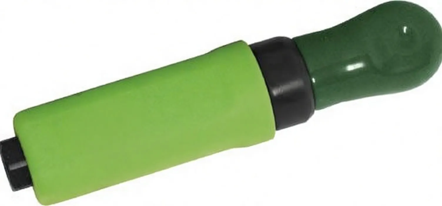 Top/side view of green oscillating sander showing safety pictograms and CE mark on black ring, circular adjustment screw on sleeve.