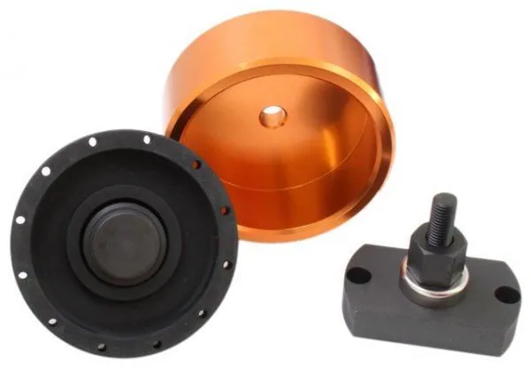 Orange cup, rubber seal driver with flange holes, and rectangular mounting block with threaded stud