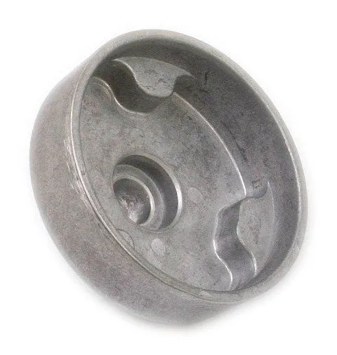 Interior view of a camshaft wrench showing three profiled engagement slots and a central recessed area