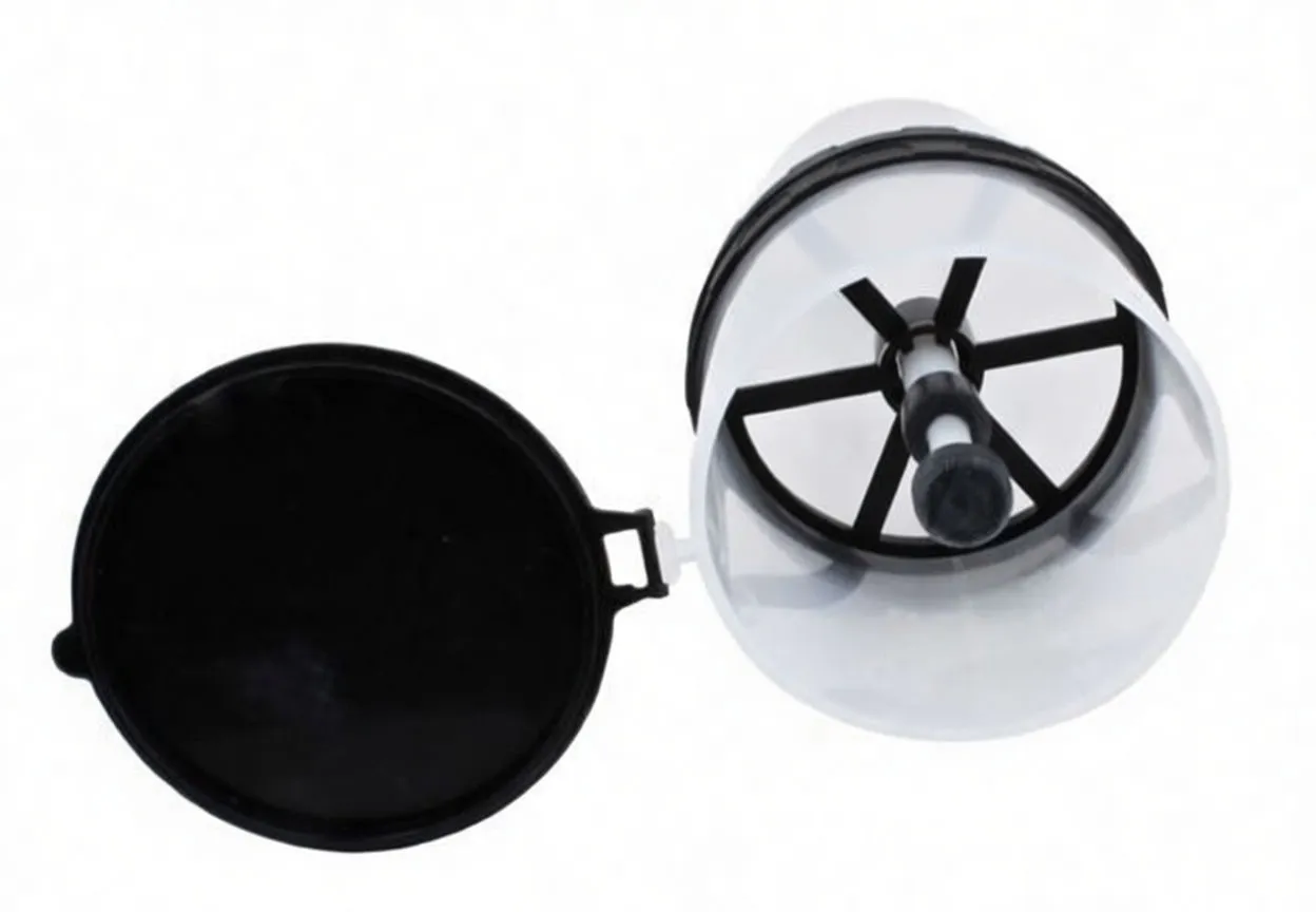 Top-down interior view of funnel showing radial support spokes and central valve stem with black hinged lid