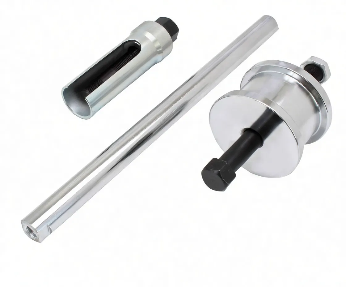 Close-up of a slotted extractor, chrome rod and round puller cup with central hex bolt on white background