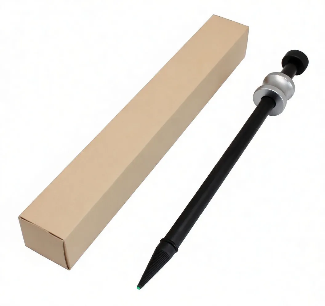 Diesel injector seal puller next to blue-and-white satra retail box, showing pointed tip with green cap and silver collar