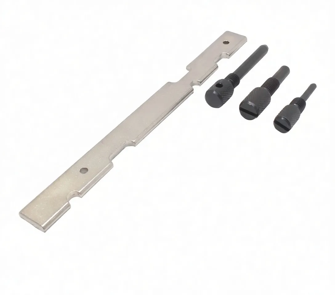 Angled view of engine timing set showing metal notched timing plate stamped with brand, three black knurled timing pins of varying lengths and a triangular wire clip.