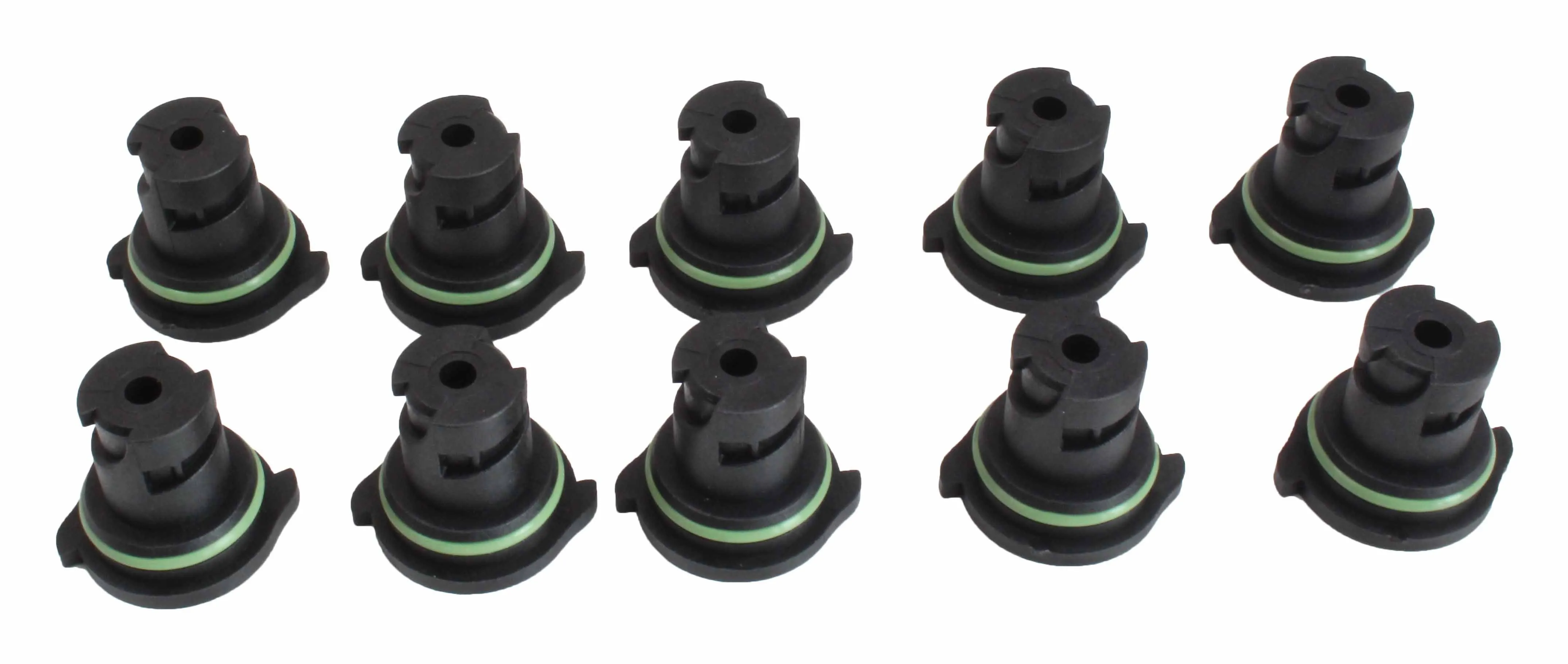 Top view of ten matching black plastic drain plug keys with green O-rings and slotted stems arranged on white background.