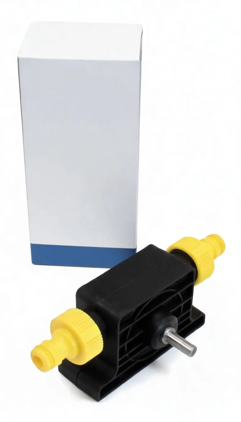 Pump for drill shown in front of retail box labeled 'saTra S-1PDW Pump for Drill'; black pump with metal shaft and yellow hose connectors.