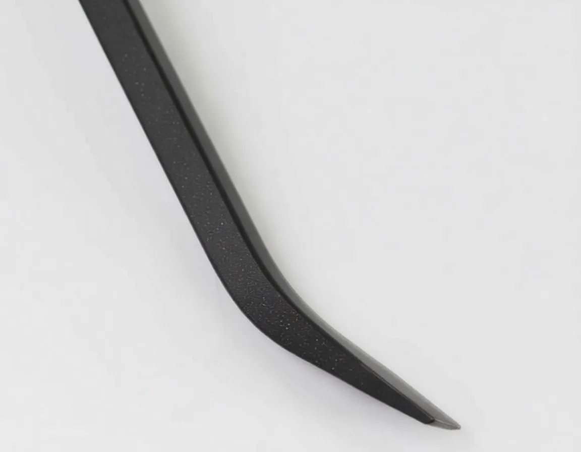 Close-up of angled, beveled tip of a black pry bar