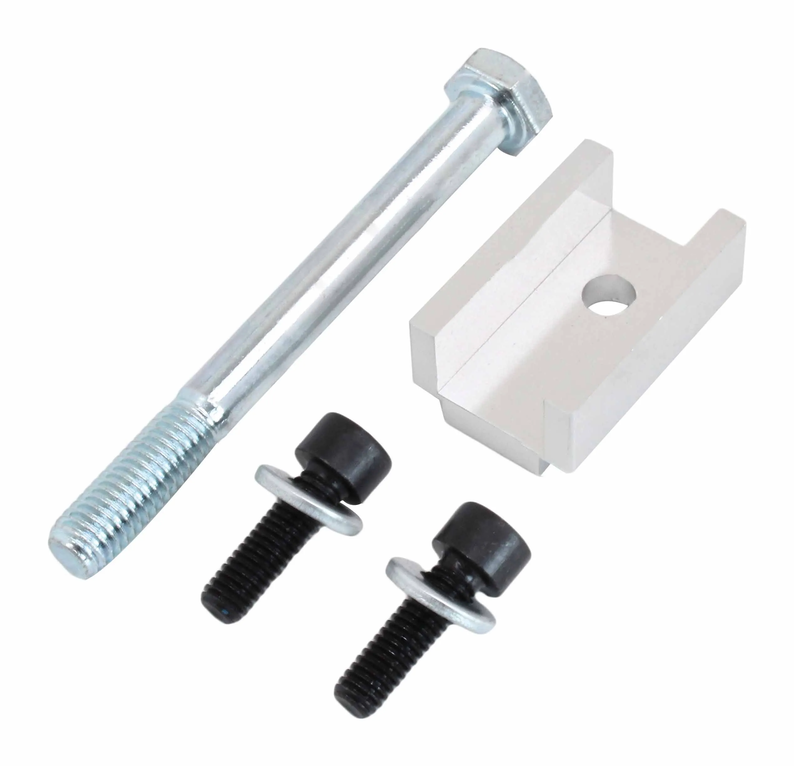 Close-up of long zinc bolt, U-shaped aluminum locating block with hole, and two short black bolts with washers and rubber spacers.