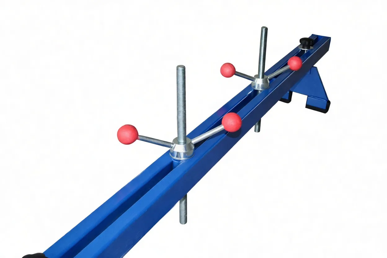 Angled view showing red-handled cross bolts, threaded rods and hanging chains on beam