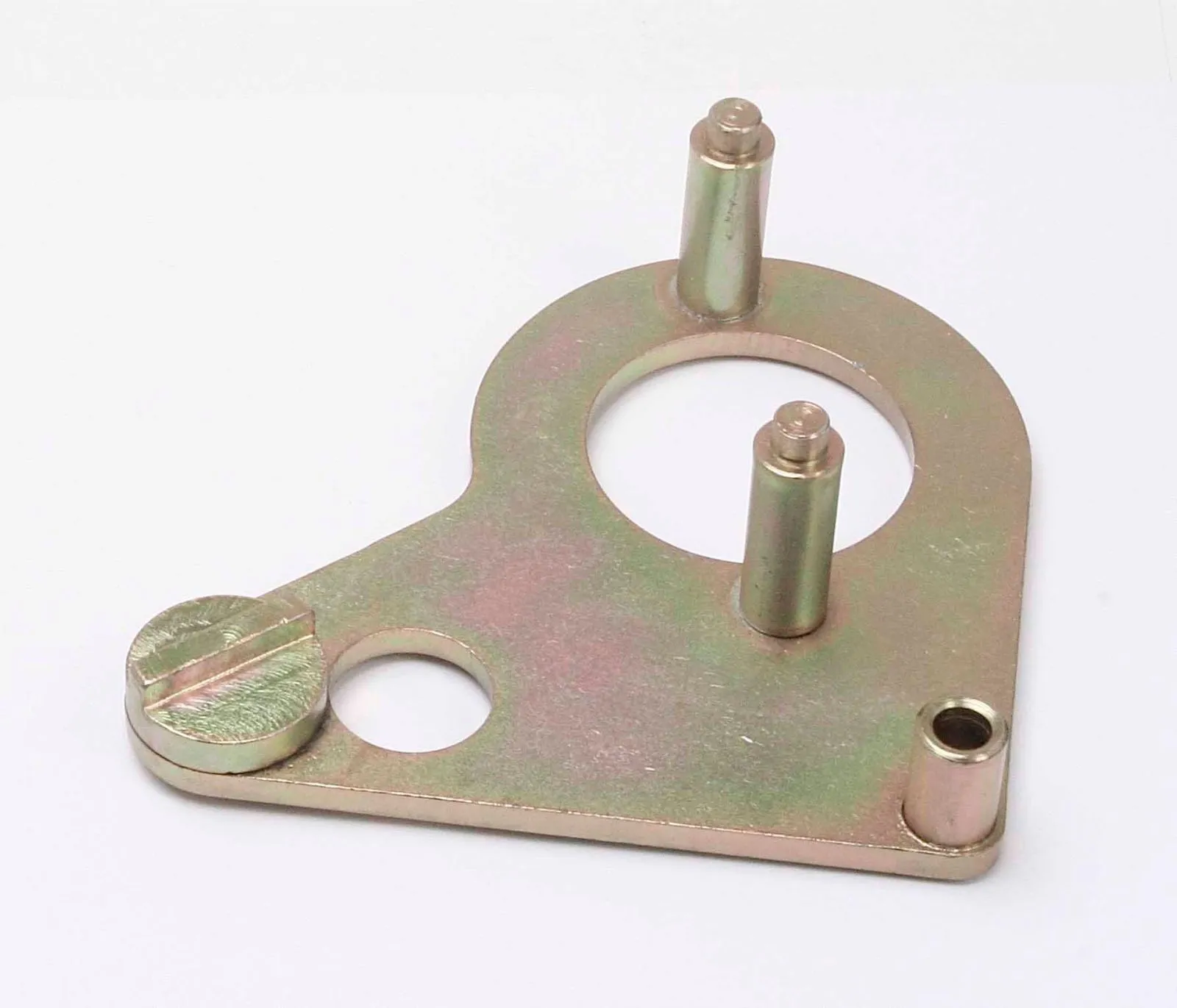 Triangular gold-plated locking plate with two vertical locating pins, central circular hole and slotted screw plug